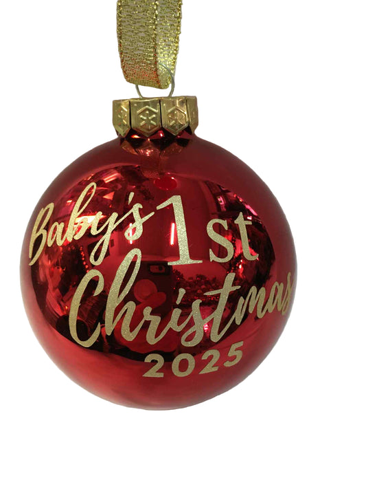 Red Christmas ornament with 'Baby's 1st Christmas 2025' text on a white background