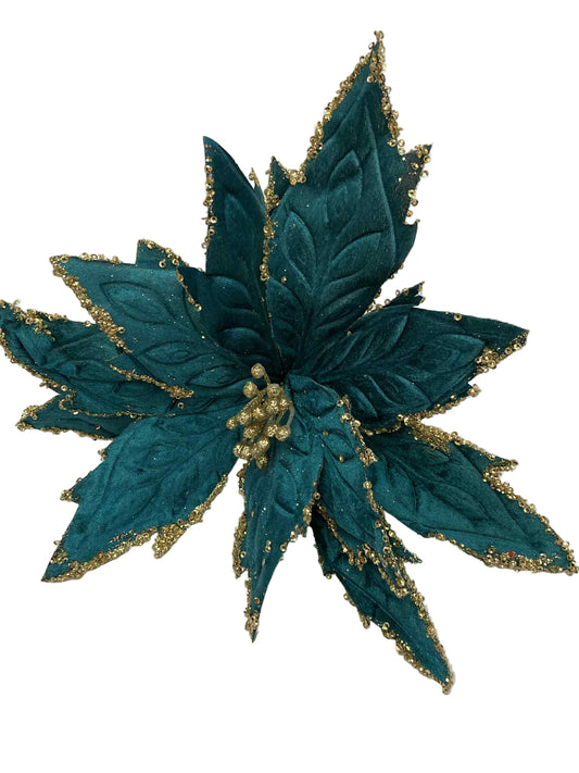 Teal flower with gold accents on a white background