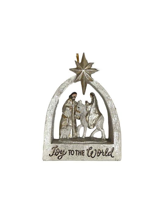 Decorative Christmas ornament with 'Joy to the World' text on a plain background