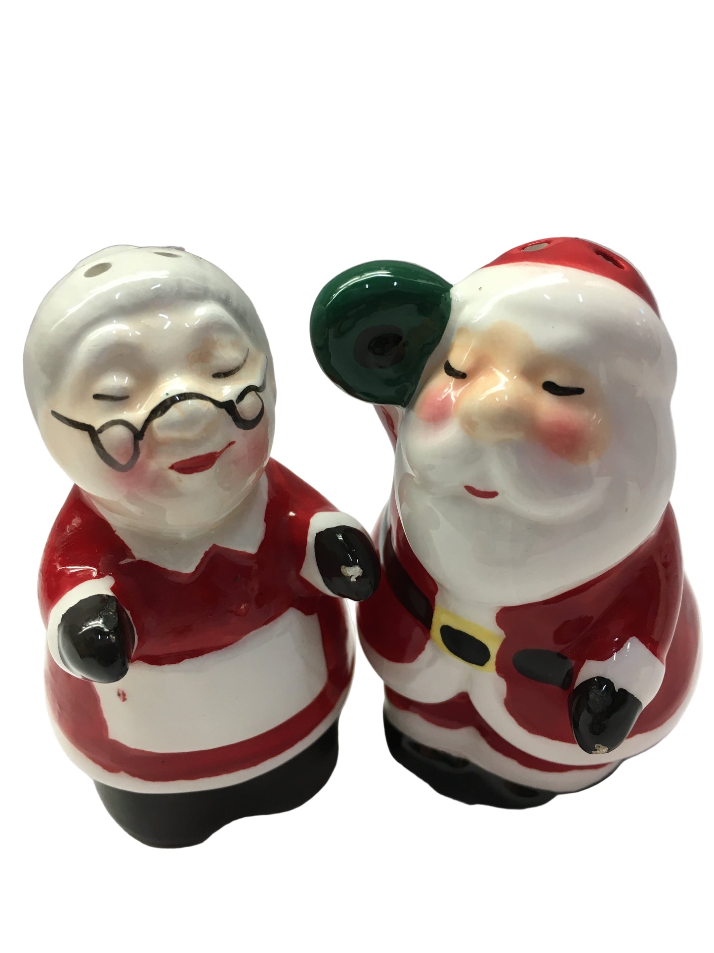 Two ceramic Santa Claus figurines on a white background