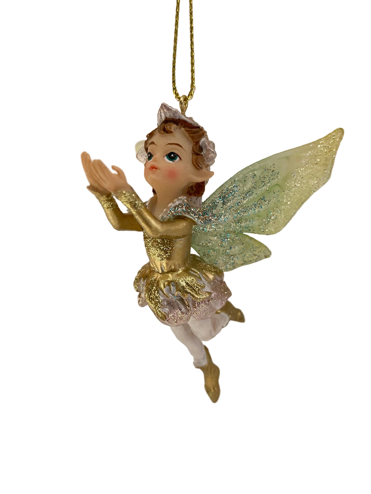 A hanging fairy ornament with a gold glittery dress, pale skin, brown hair, and translucent green wings with glitter, suspended by a gold string against a plain light background.